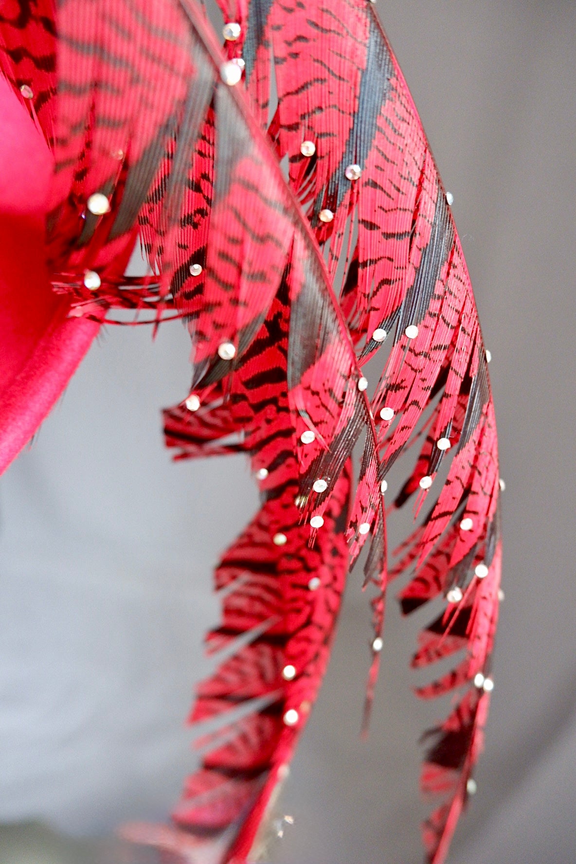 Vintage Jack McConnell Red Feather Hat – Sculptural Couture with Spotted Plumage and Rhinestone Trim