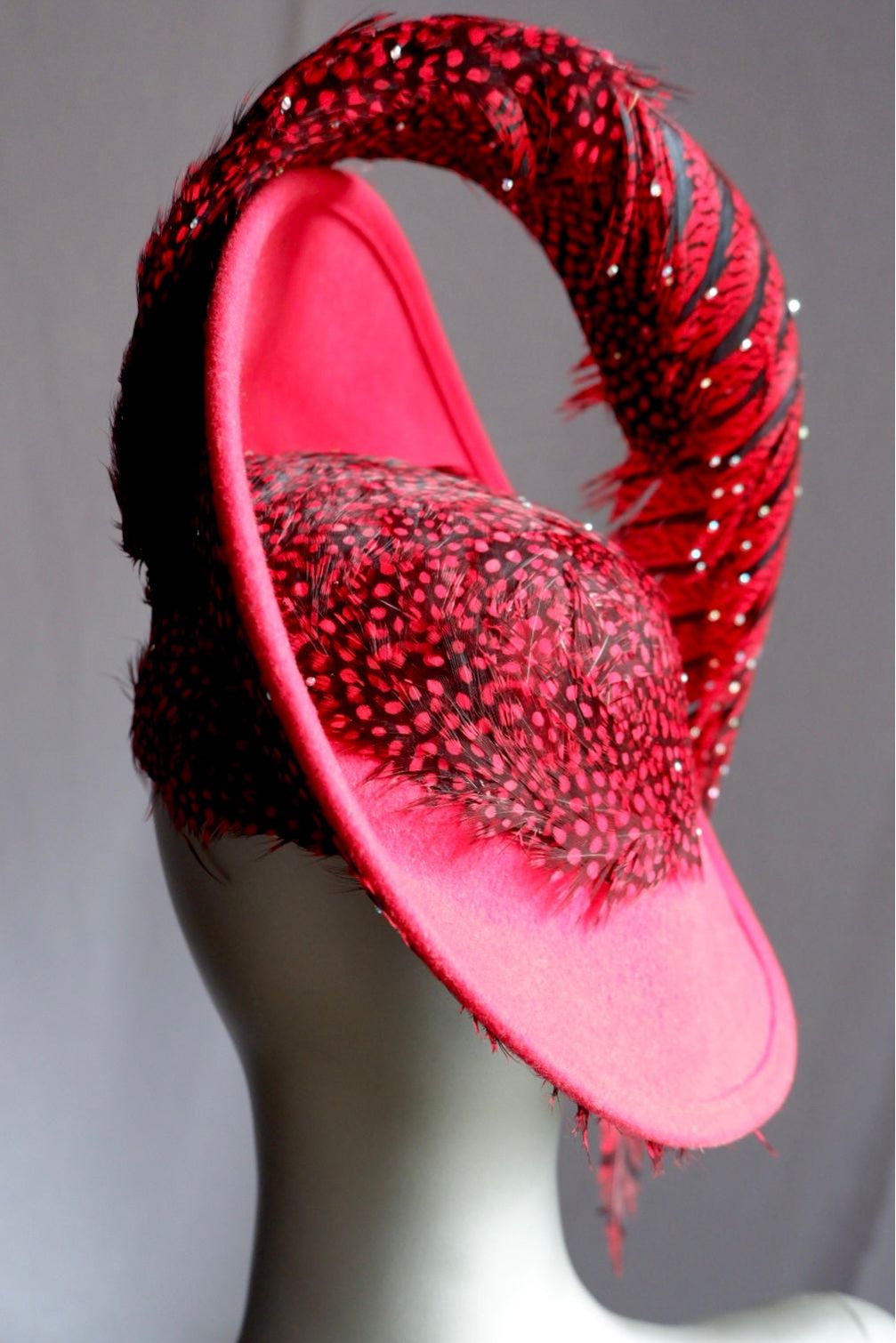 Vintage Jack McConnell Red Feather Hat – Sculptural Couture with Spotted Plumage and Rhinestone Trim