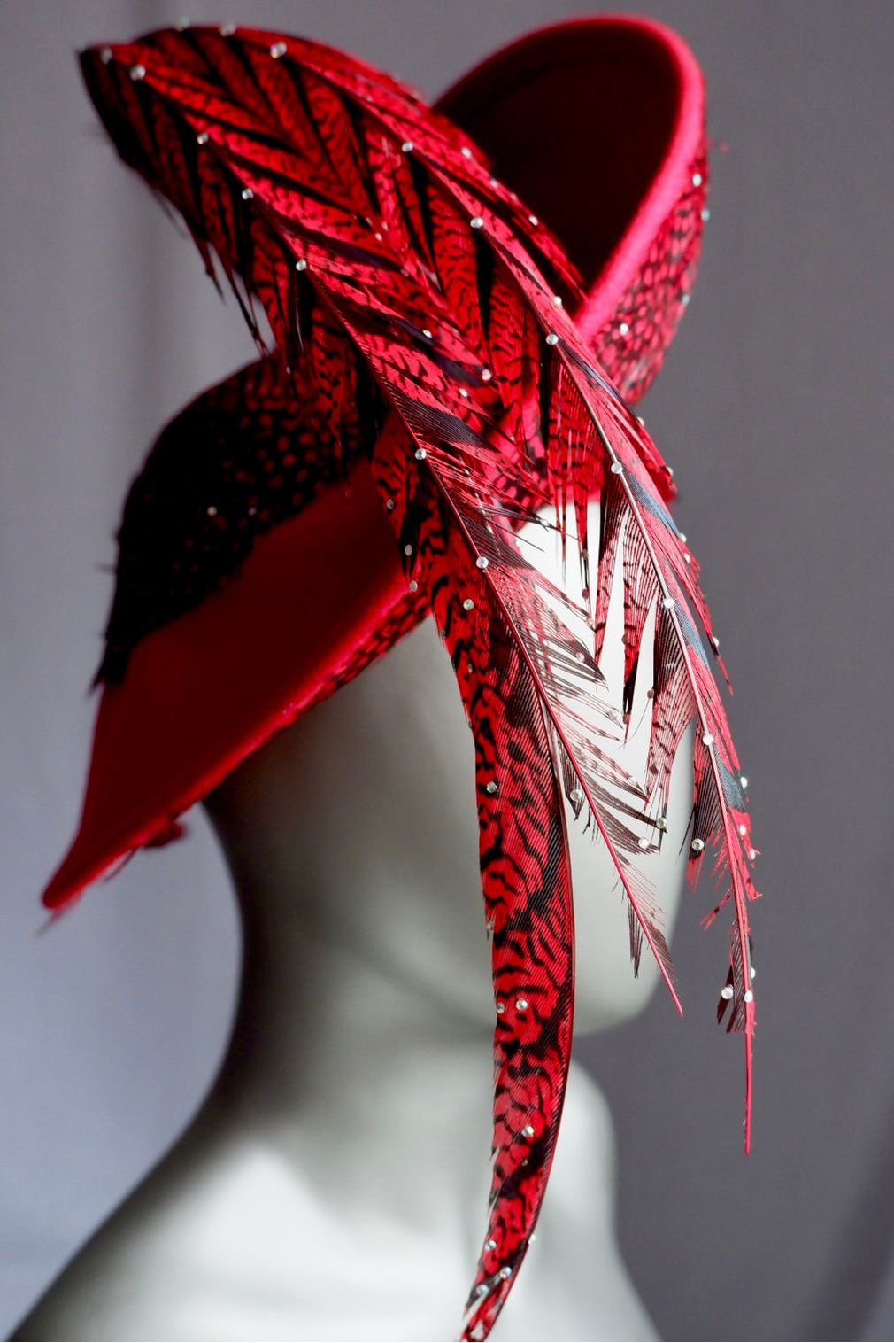 Vintage Jack McConnell Red Feather Hat – Sculptural Couture with Spotted Plumage and Rhinestone Trim