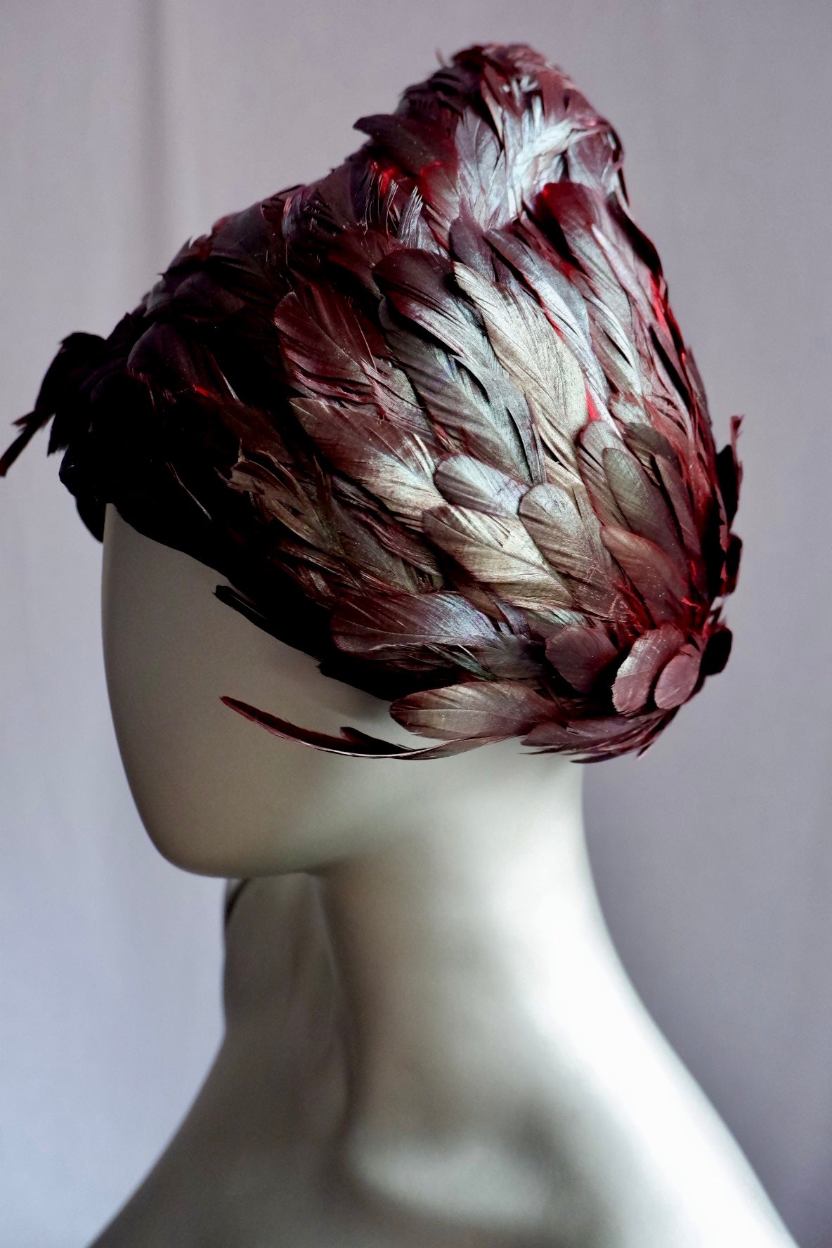 Vintage Jack McConnell Feathered Avant-Garde Hat – Garnet Coque & Goose Plumage with Signature Red Feather