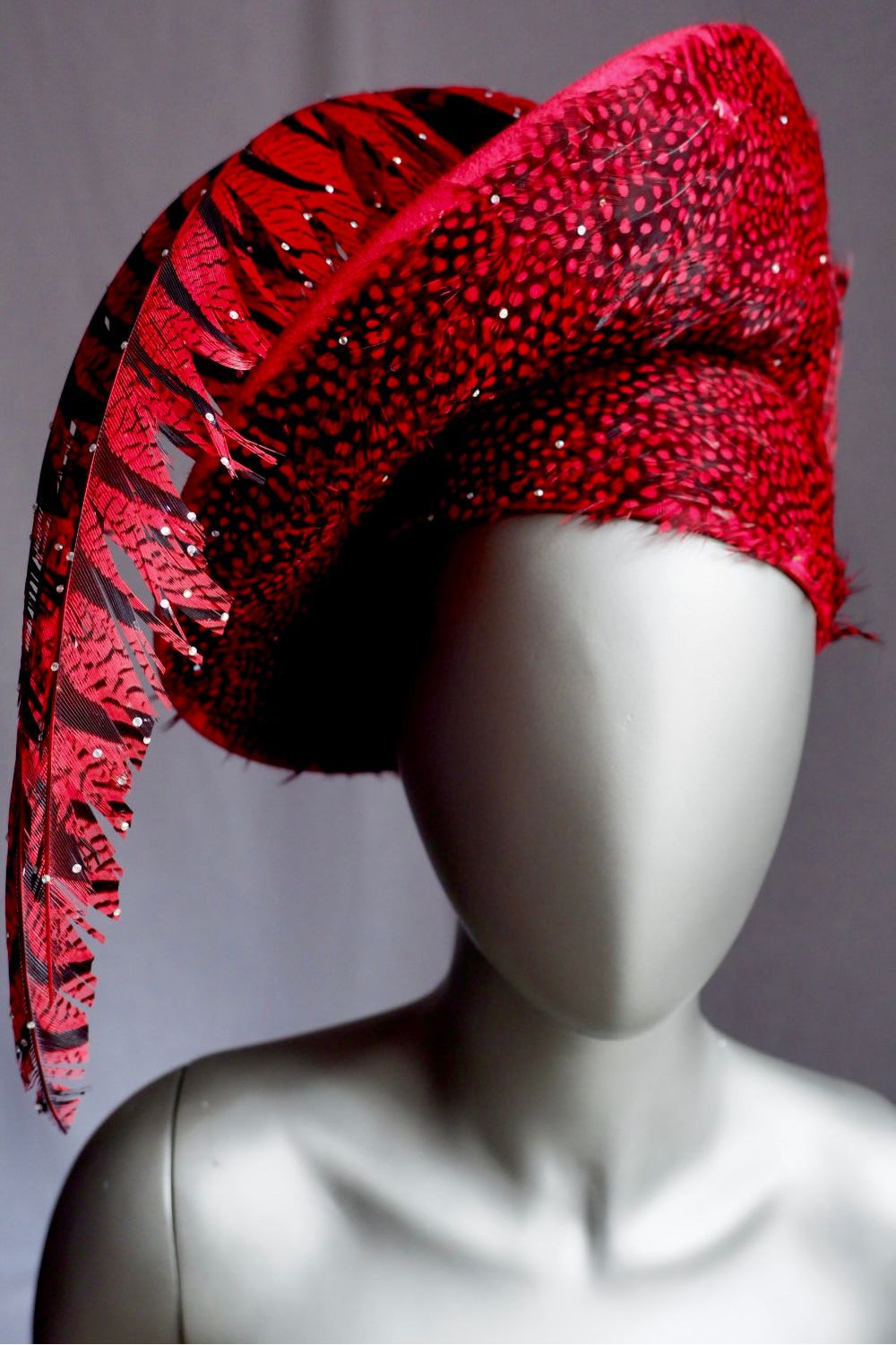 Vintage Jack McConnell Red Feather Hat – Sculptural Couture with Spotted Plumage and Rhinestone Trim