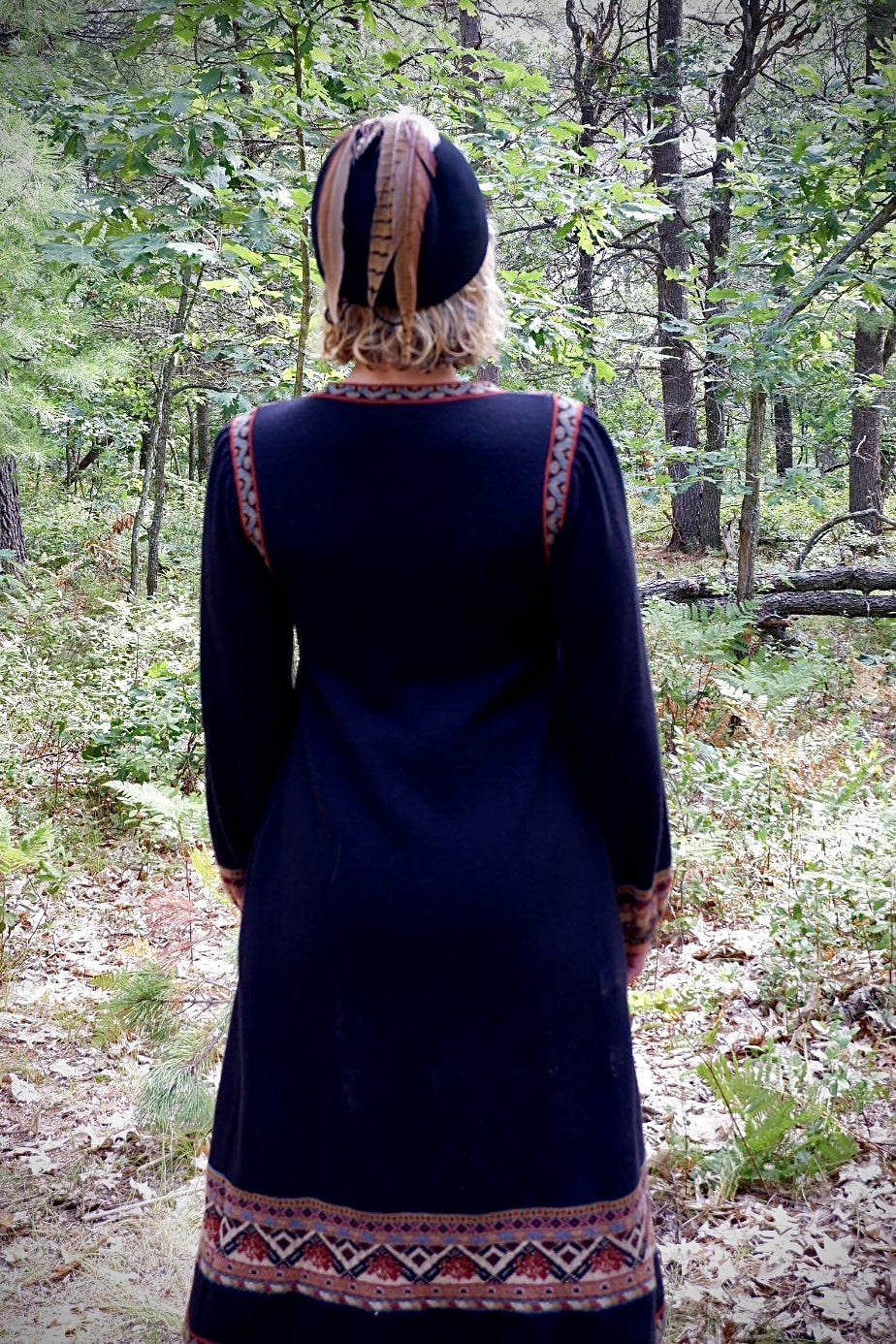 Back view of the John Ashpool knit duster with patterned hem band