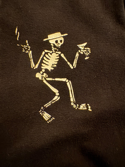 Skelly skeleton logo print on a black Social Distortion hoodie