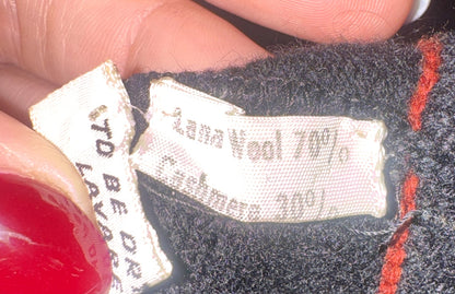 70% wool 30% cashmere fiber label on a John Ashpool knit