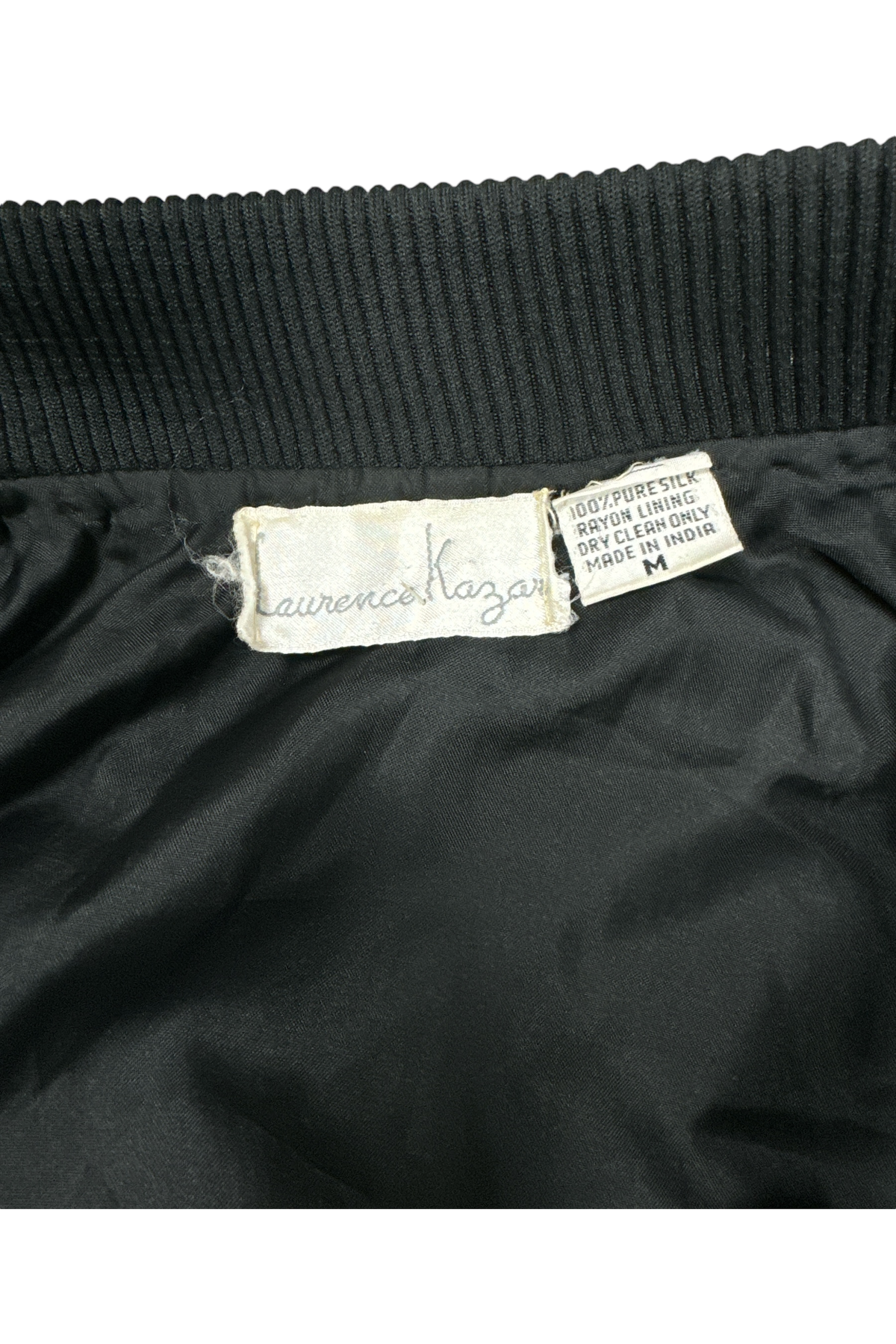 Laurence Kazar label and 100% silk, rayon lining, made in India, size M fiber tag