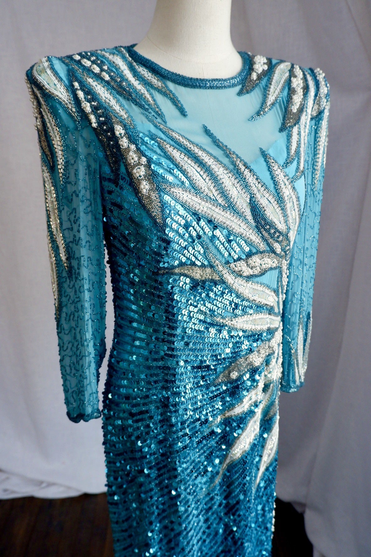 1980s hand-beaded turquoise sequin and pearl silk evening gown, front view on dress form
