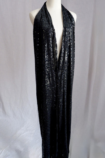 Donna Karan sequin gown shown untied, with long wrap panels hanging open