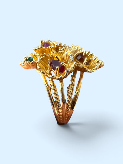 Side profile of vintage ESPO cocktail ring showing high-set flower cluster on open split rope-twist shank