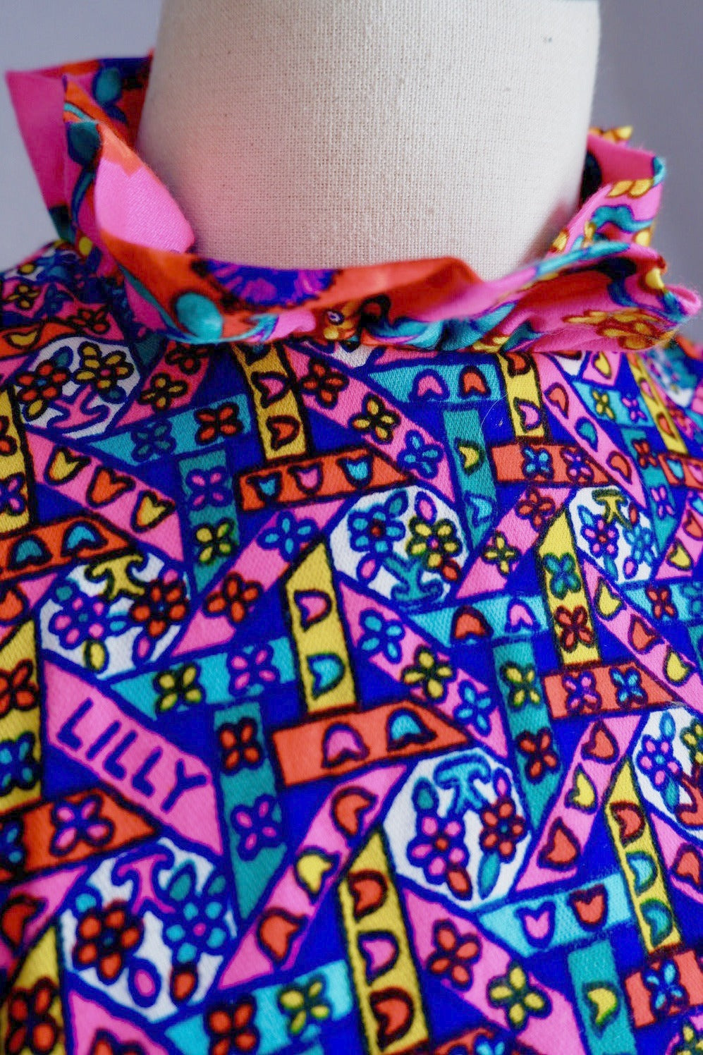 Ruffled stand collar and LILLY signature print on vintage The Lilly dress bodice