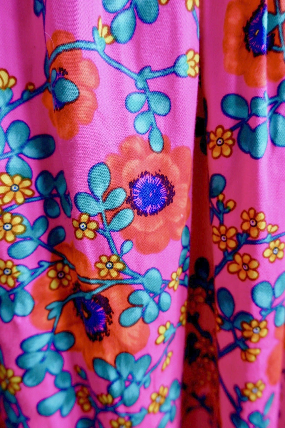 Orange poppy and yellow floral print on hot pink skirt of vintage Lilly Pulitzer dress