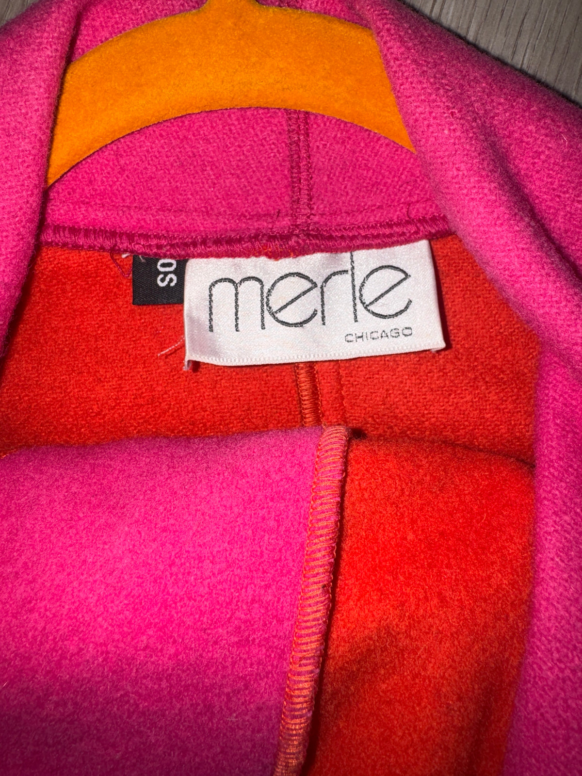 Merle Chicago label inside pink and orange wool coat