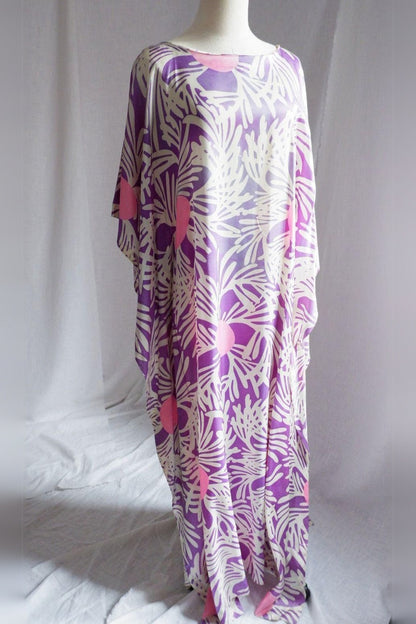 1980s purple and pink floral caftan on dress form