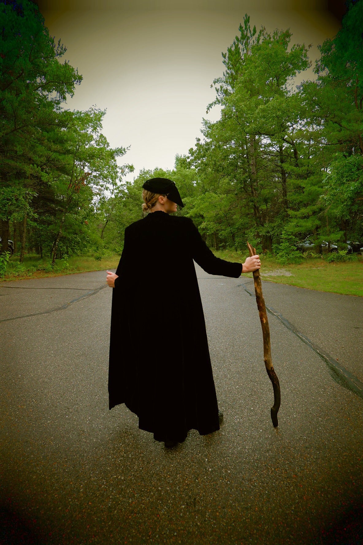 Black velvet opera cape back view held open