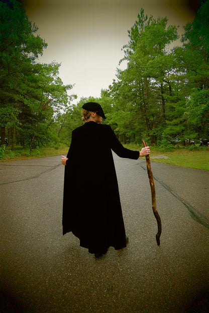 Black velvet opera cape back view held open